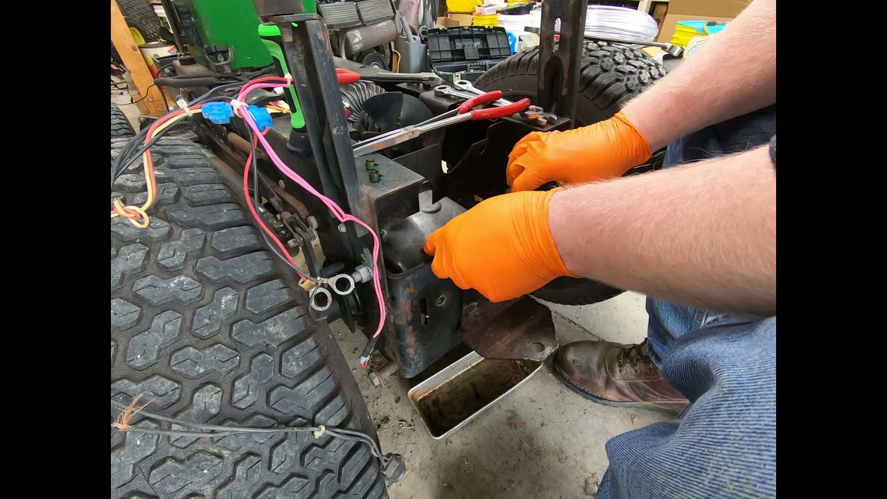 Troubleshooting Guide: Fixing a Stuck John Deere Mower Deck in the Up Position